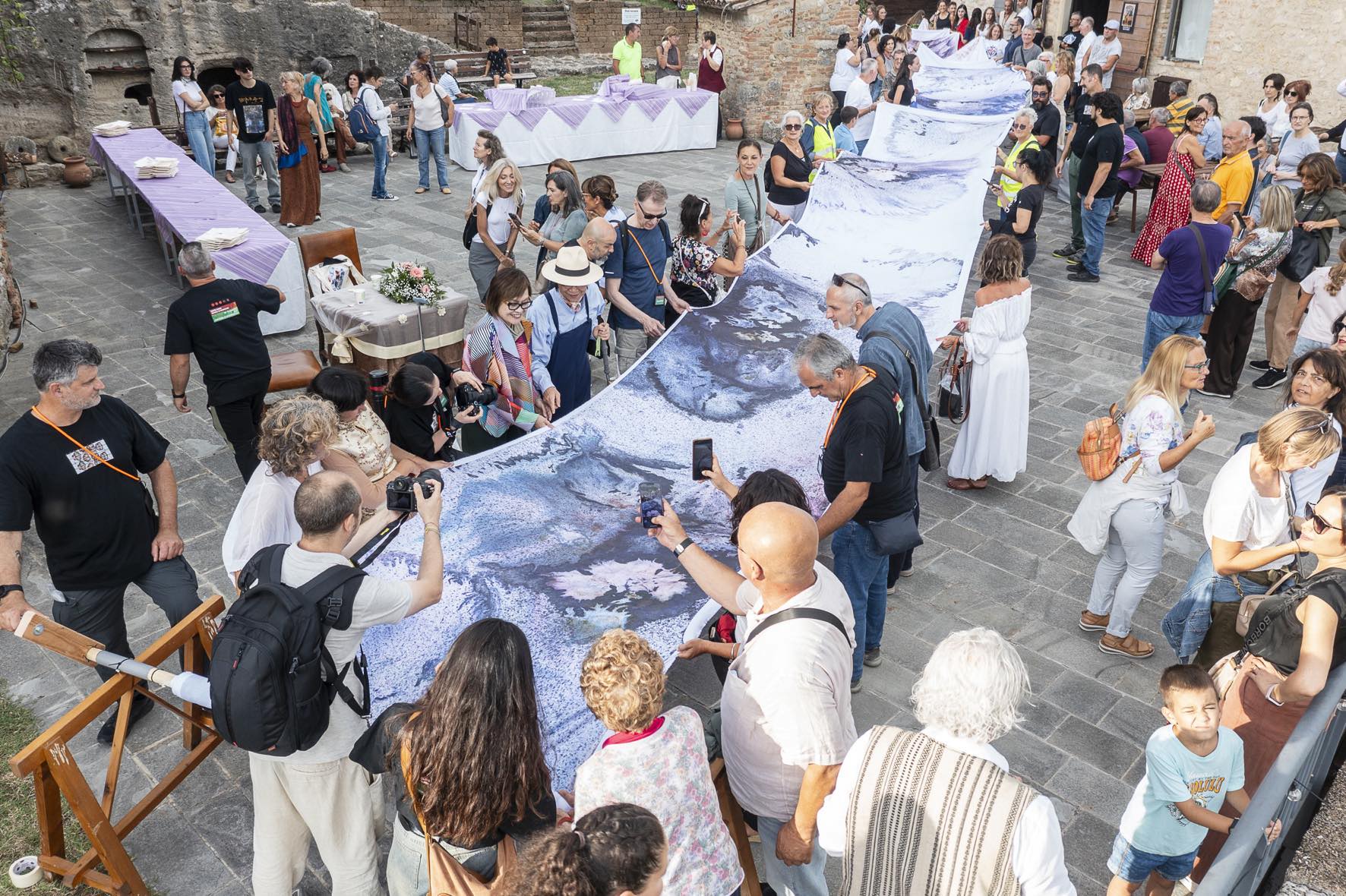 Visitors viewing the reborn canvas