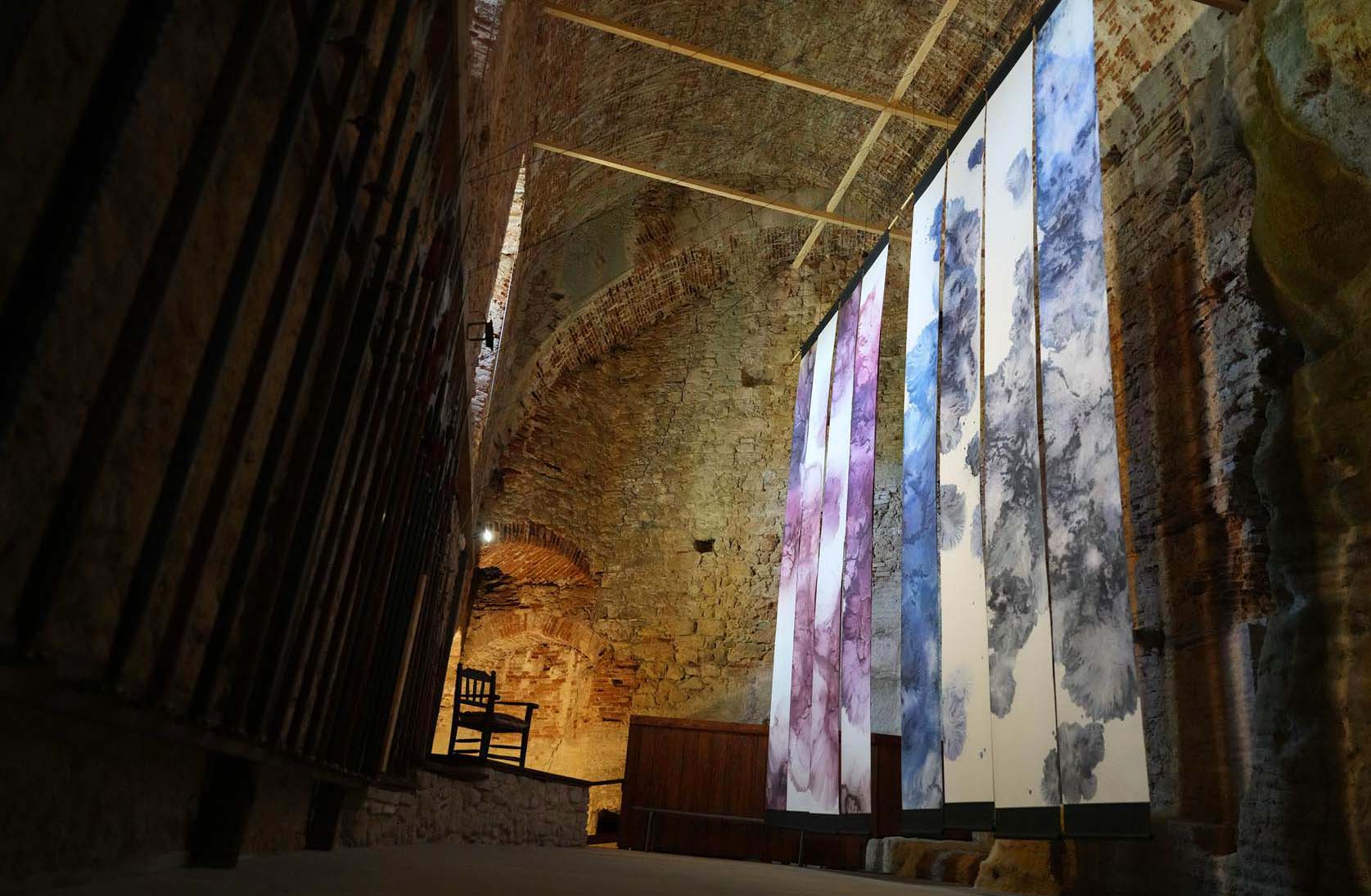 David Chan ice paintings exhibited inside the castle